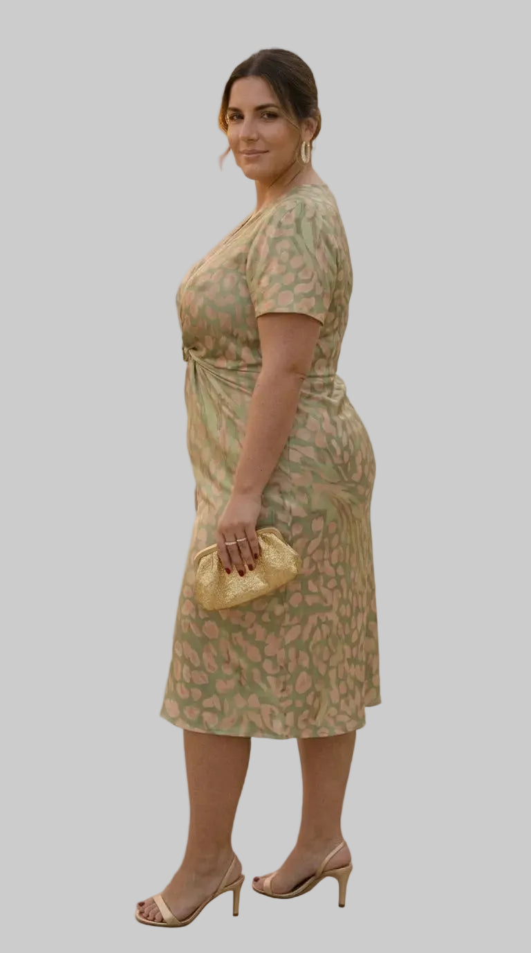 Vestido midi efecto estilizador con nudo central y caída fluida